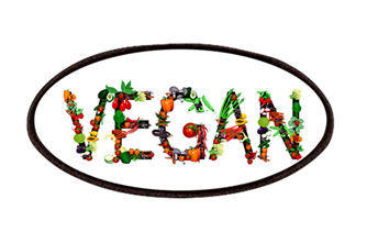 The word VEGAN spelled out in vegetables on a patch to sew onto clothing.